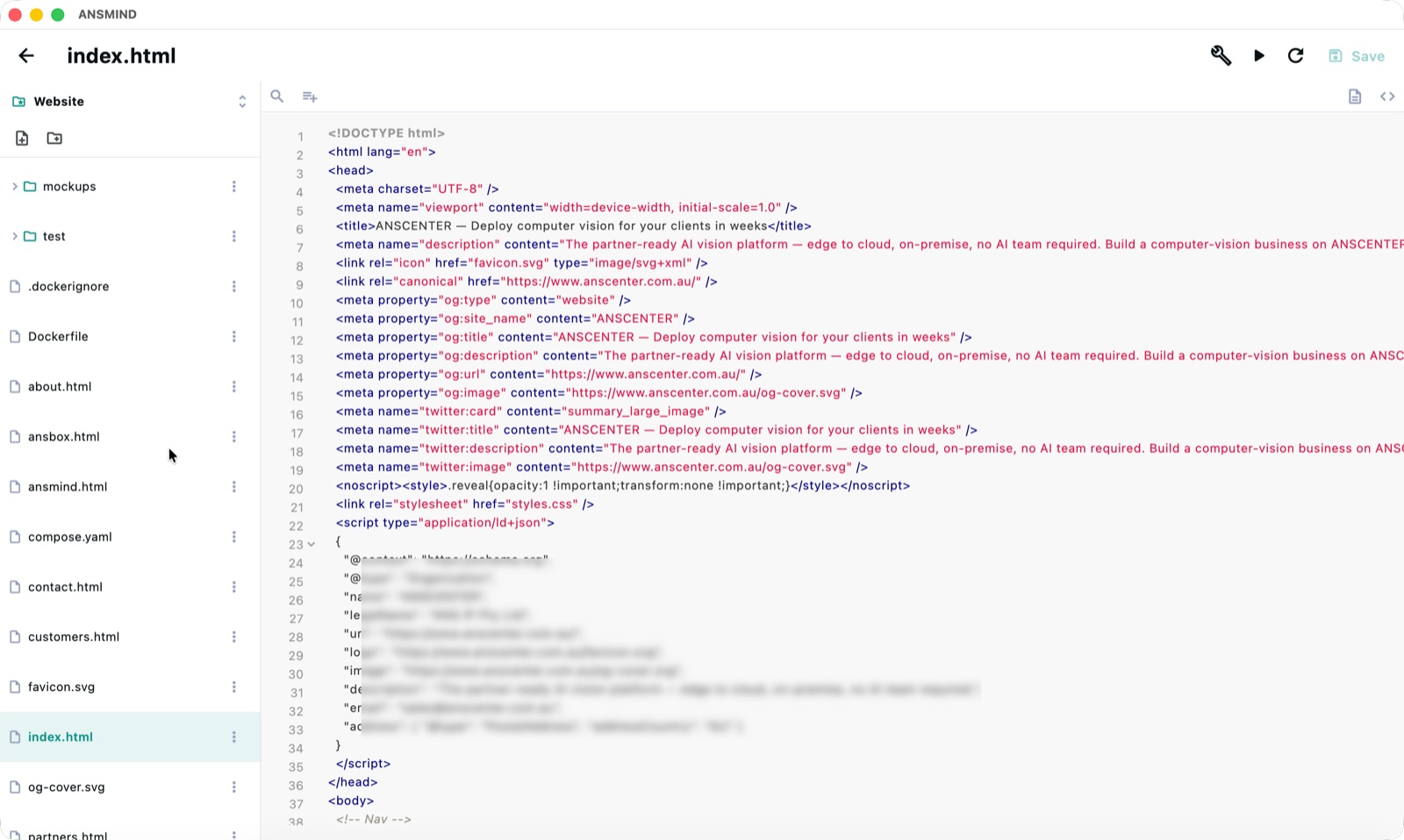 Built-in code editor with file tree and syntax-highlighted HTML open at index.html
