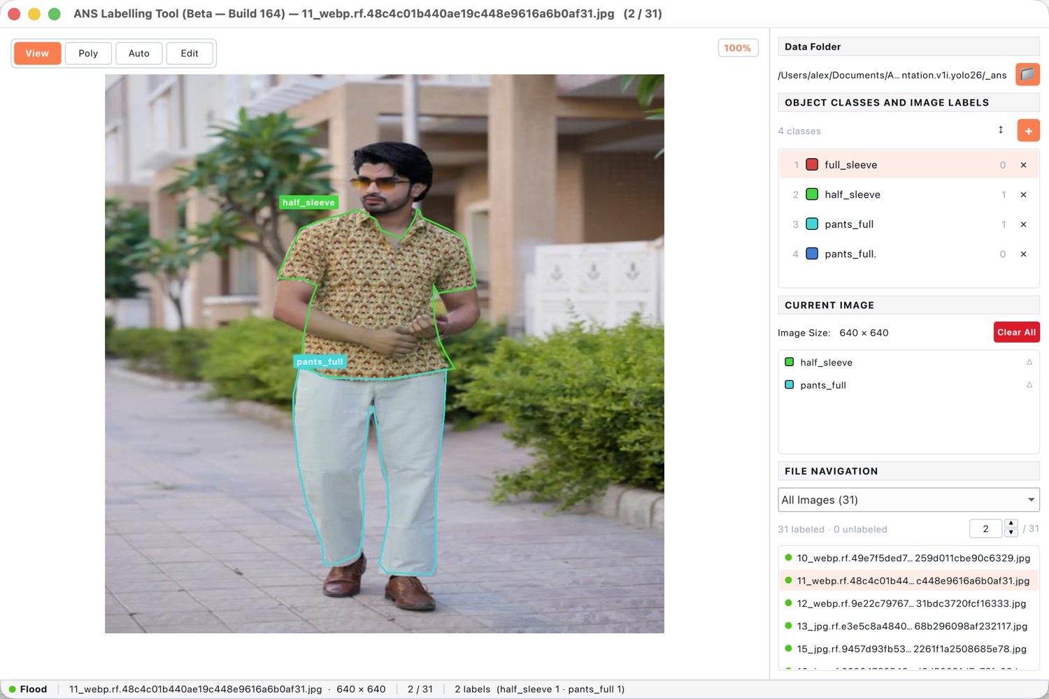 Labelling tool tracing polygon segmentation masks around clothing on a person.